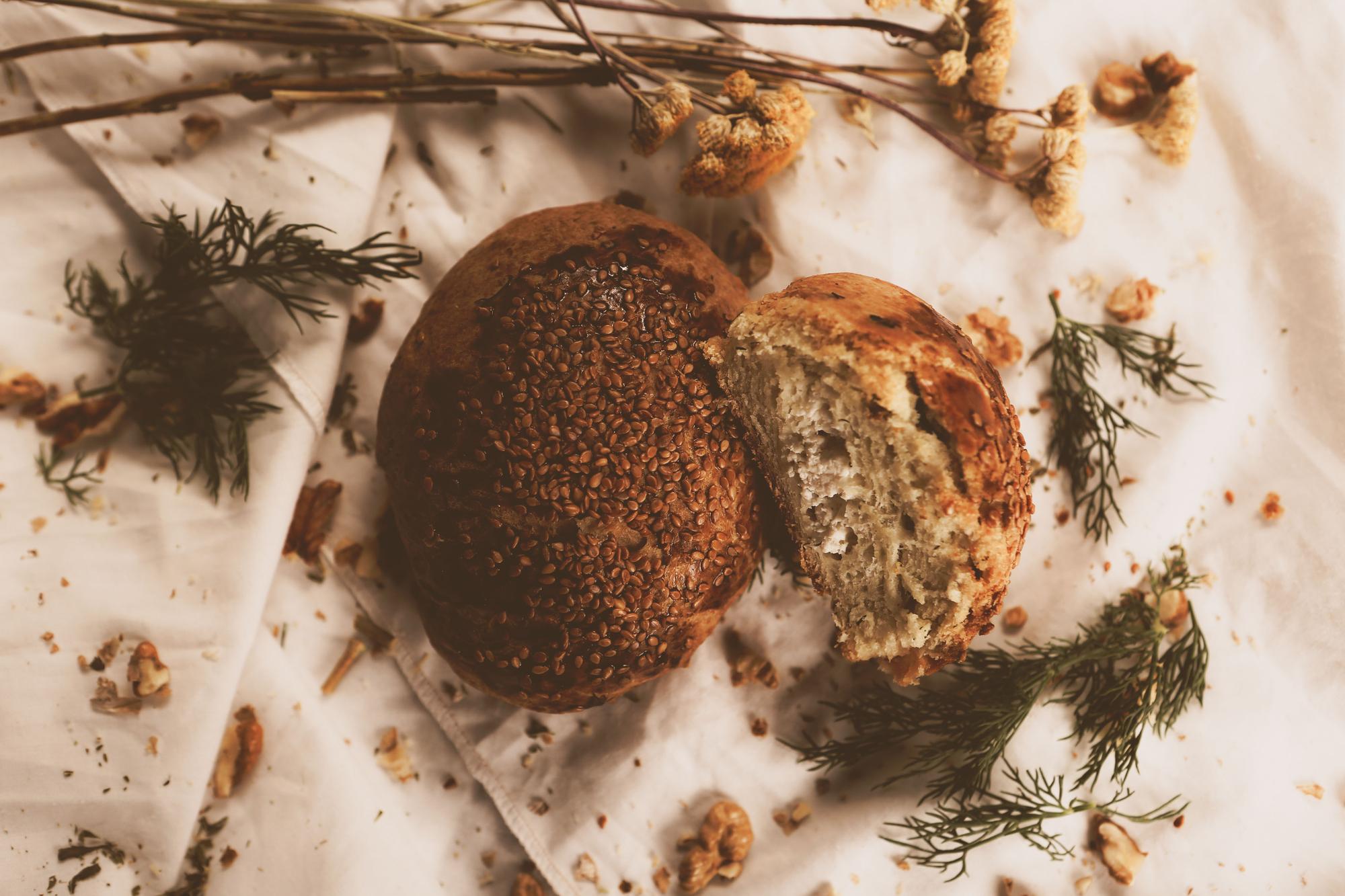 Close-up of baked bread and herbs